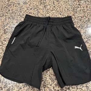 Puma Black Men’s medium lined running shorts. Excellent condition.